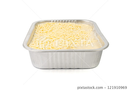 Lasagna portion in aluminium foil tray isolated. Oven baked lasagne for heating, container, airplane food Lasagna portion in aluminium foil tray isolated. Oven baked lasagne for heating, container, airplane food 121910969