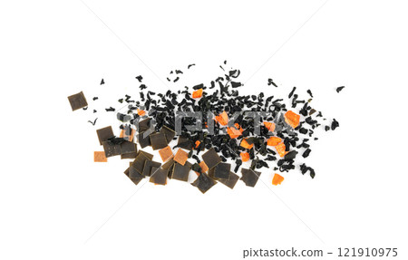 Dry kelp seaweed squares, mini wakame pieces isolated, dried kombu and carrot flakes from ramen 121910975