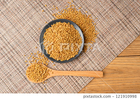Fenugreek Seeds, Dry Trigonella, Spicy Methi Dana Grains, Indian Kitchen Seasoning Ingredient Fenugreek Seeds, Dry Trigonella, Spicy Methi Dana Grains, Indian Kitchen Seasoning Ingredient 121910998