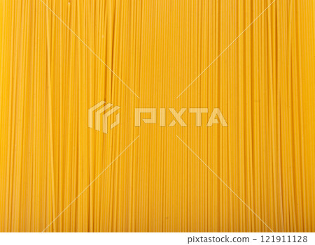 Raw spaghetti texture background, dry spagetti pattern, long wheat noodles banner Raw spaghetti texture background, dry spagetti pattern, long wheat noodles banner 121911128