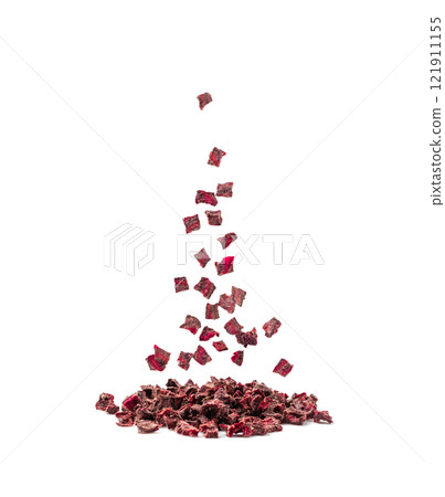 Falling Dry beetroot pile isolated. Flying Dried diced red beet cubes, scattered small beet root 121911155