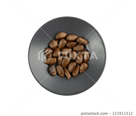 Cherimoya seeds isolated, Annona Cherimola pits, chirimoya stones or chirimuya fruit kernels on white 121911312