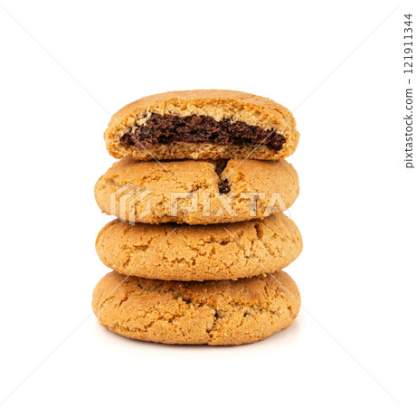 Chocolate cookies with chocolate filling isolated, brown round biscuits, broken sweet cocoa pastry 121911344