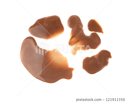 Spilled chocolate milk isolated, hot chocolate puddle, liquid stain, coffee splatter, brown latte Spilled chocolate milk isolated, hot chocolate puddle, liquid stain, coffee splatter, brown latte 121911350