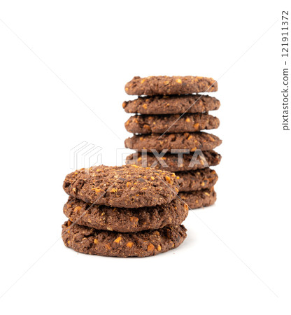 Chocolate oatmeal cookies, healthy cereal oat crackers with nuts, crispy homemade cookie with cocoa powder Chocolate oatmeal cookies, healthy cereal oat crackers with nuts, crispy homemade cookie with cocoa powder 121911372