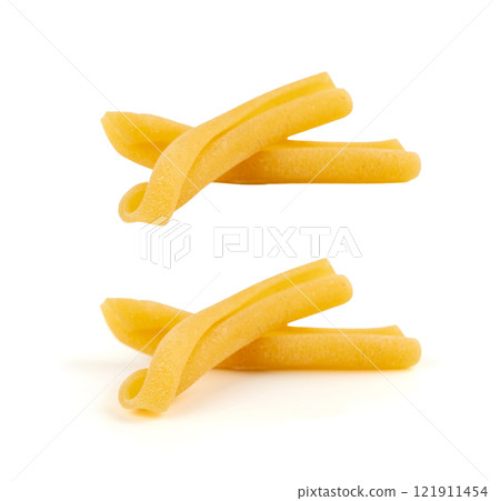 Casarecce pasta isolated, dry traditional macaroni, raw casarecce, wheat noodles, Italy cuisine ingredient Casarecce pasta isolated, dry traditional macaroni, raw casarecce, wheat noodles, Italy cuisine ingredient 121911454