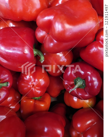 Red bright shiny peppers lie Red bright shiny peppers lie 121911497