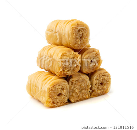 Rolled Baklava Isolated, Ramadan Dessert Roll on Restaurant Plate, Eastern Sweet Pastries Rolled Baklava Isolated, Ramadan Dessert Roll on Restaurant Plate, Eastern Sweet Pastries 121911516