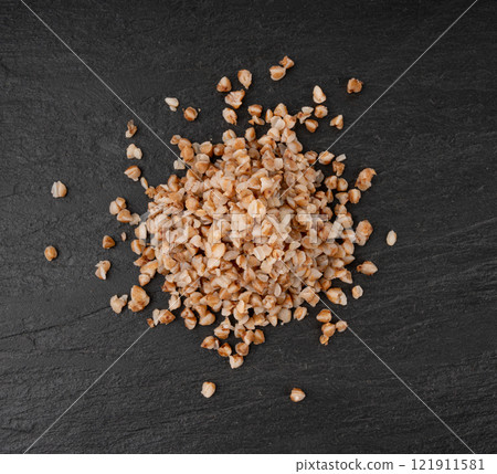 Boiled Buckwheat Pile on Black, Cooked Buck Wheat Grains, Porridge Heap, Cook Buckwheat Boiled Buckwheat Pile on Black, Cooked Buck Wheat Grains, Porridge Heap, Cook Buckwheat 121911581