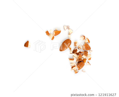 Crushed almonds isolated, nut pieces, sliced scattered almond seeds and cut kernels collection on white background Crushed almonds isolated, nut pieces, sliced scattered almond seeds and cut kernels collection on white background 121911627