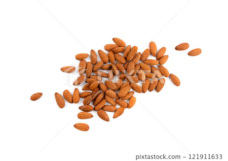 Almonds pile isolated, nut group, almond seeds, brown scattered fruit kernels on white background 121911633