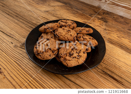 Chocolate chips cookies , American biscuits, cocoa confectionery cake, sweet morsels bakery 121911668