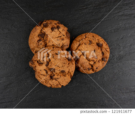 Chocolate chips pile cookies , American biscuits, cocoa confectionery cake, sweet morsels bakery 121911677