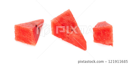 Watermelon pieces isolated. Water melon wedges pile, chopped Citrullus lanatus, red wassermelone cuts group 121911685