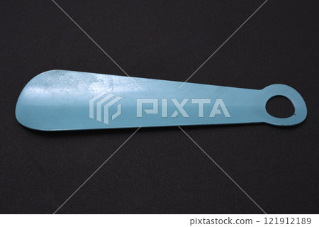A shoe spoon. A tool for comfortable putting on shoes. 121912189