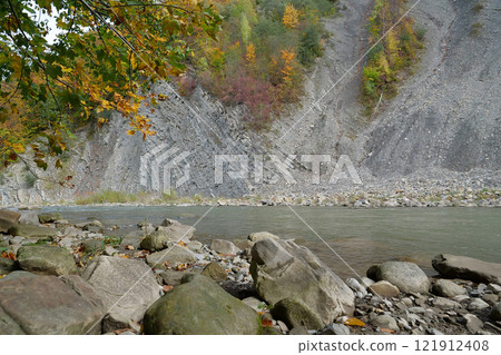 Beautiful mountain river with rapid current. Prut river and mountain folds 121912408