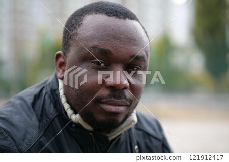 African american man from Nigeria looks at camera 121912417