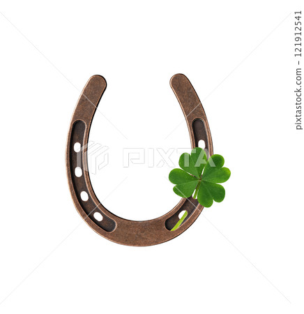 Horseshoe with lucky clover four leaf isolated on white background. St Patrick's holiday lucky symbol horseshoe with shamrock for design. 121912541