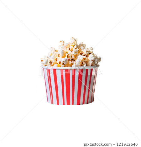 Freshly popped popcorn in a classic striped container ready for a movie night at home 121912640