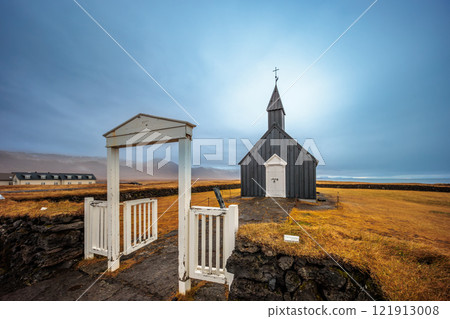 The traditional wooden church of Budakirkja in the autumn landscape in the west of Iceland The traditional wooden church of Budakirkja in the autumn landscape in the west of Iceland 121913008