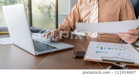 Business meeting in modern office desk setup professional analysis collaborative environment focused view strategic planning 121914607