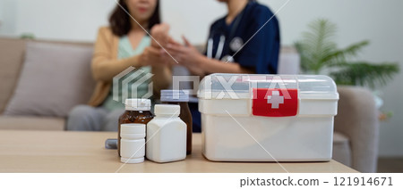 Caregiver assesses elderly patient symptoms in medical checkup home environment compassionate viewpoint 121914671