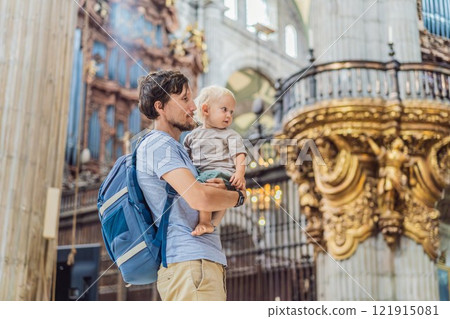 Father and his son tourists exploring the Metropolitan Cathedral in Mexico City. Woman admiring the architecture and history of Mexico's iconic landmark. Concept of cultural heritage, religious 121915081
