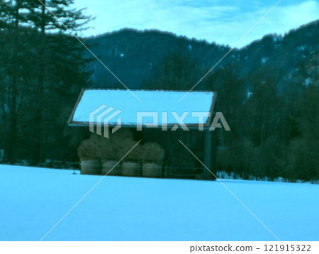 wooden hut in the winter forest 121915322