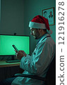 Doctor in New Year Hat on Green Screen Background 121916278