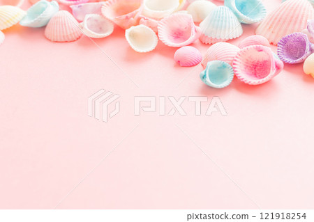 Pastel colored seashells on a pink background Summer background material Pastel colored seashells on a pink background Summer background material 121918254