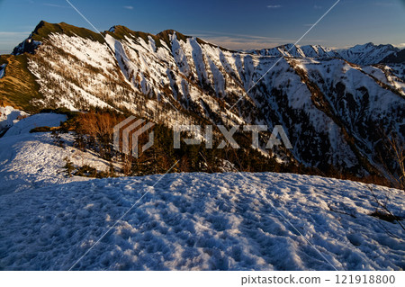 Mount Jijigatake, Mount Harinoki, and Mount Renge seen in the evening light from near Hiyaike Pond in the Northern Alps Mount Jijigatake, Mount Harinoki, and Mount Renge seen in the evening light from near Hiyaike Pond in the Northern Alps 121918800