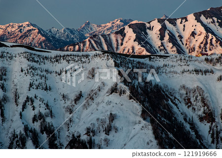 The Yari and Hotaka mountain ranges at dawn as seen from the climb to Mount Kashima-Yari in the Northern Alps 121919666