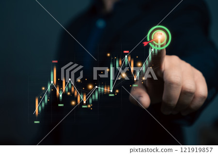 Businessmen Analysis stock market finance volume of stock market investment with graph and chart hologram technology. Stock graph and financial chart. Currency market. Take Profits. Businessmen Analysis stock market finance volume of stock market investment with graph and chart hologram technology. Stock graph and financial chart. Currency market. Take Profits. 121919857
