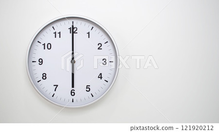 Minimalist White Clock with Silver Frame Striking 18.00/06.00 on White Background. Perfect for Time Management and Corporate Campaigns 121920212