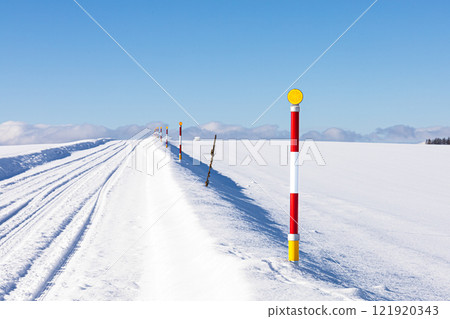 Winter road conditions in Hokkaido and snow poles Winter road conditions in Hokkaido and snow poles 121920343