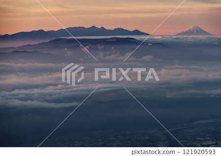 Mount Fuji and Yatsugatake seen at sunrise from the climb to Mount Kashima-Yari in the Northern Alps Mount Fuji and Yatsugatake seen at sunrise from the climb to Mount Kashima-Yari in the Northern Alps 121920593