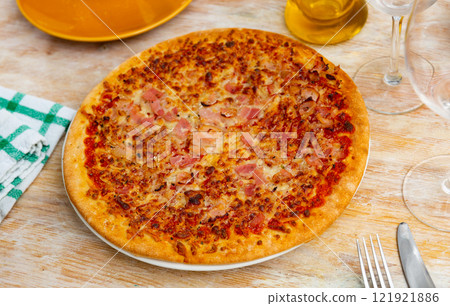 Pizza with meat and tomatoes Pizza with meat and tomatoes 121921886