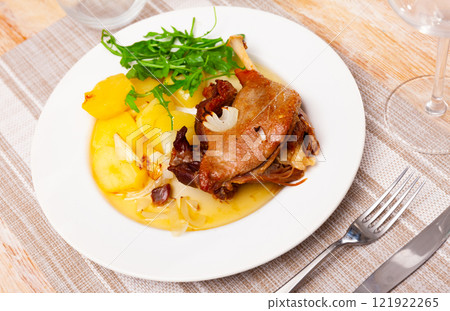 Portion of confit de canard served on plate Portion of confit de canard served on plate 121922265