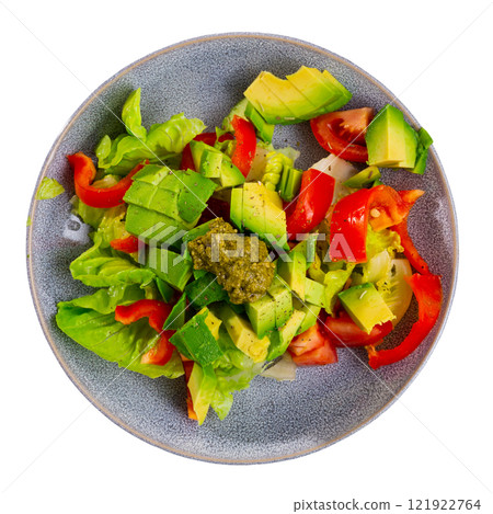 Plate contains portion of salad from fresh vegetables and pesto sauce. Plate contains portion of salad from fresh vegetables and pesto sauce. 121922764