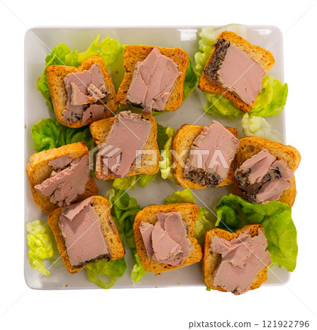 There are sandwiches with meat pate and china cabbage leaves. There are sandwiches with meat pate and china cabbage leaves. 121922796