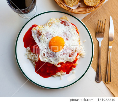 Delicious rice with sauce and fried eggs Delicious rice with sauce and fried eggs 121922840