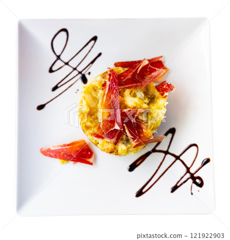 Trinxat de la Cerdanya. Typical recipe from north of Catalonia cooked with white cabbage, potato and bacon. Spanish cuisine Trinxat de la Cerdanya. Typical recipe from north of Catalonia cooked with white cabbage, potato and bacon. Spanish cuisine 121922903