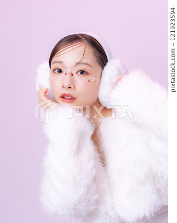 Fashion image of a woman wearing a fur coat Cosmetics, beauty, skin care 121923594