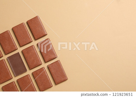 Brown chocolate bars on a light background 121923651