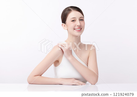 Beautiful young woman with clean fresh skin on white background, Face care, Facial treatment, Cosmetology, beauty and spa, women portrait. 121924079