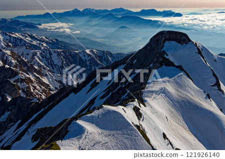 View of the northern peak and the Myoko-Togakushi mountain ranges from the summit of Mt. Kashima-Yari View of the northern peak and the Myoko-Togakushi mountain ranges from the summit of Mt. Kashima-Yari 121926140