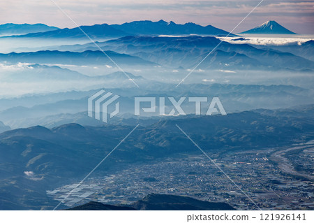 View of the Yatsugatake mountain range and Mt. Fuji from the summit of Mt. Kashimayari in the Northern Alps View of the Yatsugatake mountain range and Mt. Fuji from the summit of Mt. Kashimayari in the Northern Alps 121926141
