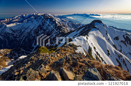 The northern peak and the mountain ranges of Mt. Hakuba, Mt. Goryu, Mt. Myoko and Mt. Togakushi as seen from the summit of Mt. Kashima-Yari 121927018