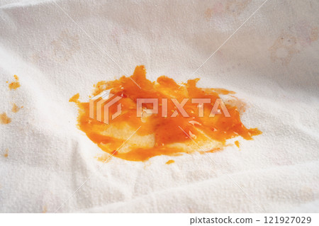 Dirty tomato sauce stain or ketchup on cloth to wash with washing powder, cleaning housework. 121927029