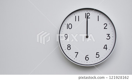 Minimalist Analog Wall Clock with White Face and Simple Black Hands Showing 12.00/00.00/24.00 - Ideal for Time Management and Modern Decor Concepts Minimalist Analog Wall Clock with White Face and Simple Black Hands Showing 12.00/00.00/24.00 - Ideal for Time Management and Modern Decor Concepts 121928162